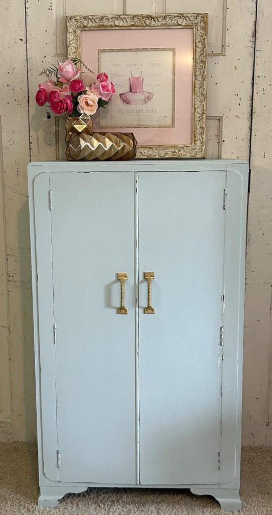 Vintage Armoire/Wardrobe/Chest  redone in SherwinWilliams "Sleepy Blue" then slightly distressed and sealed.